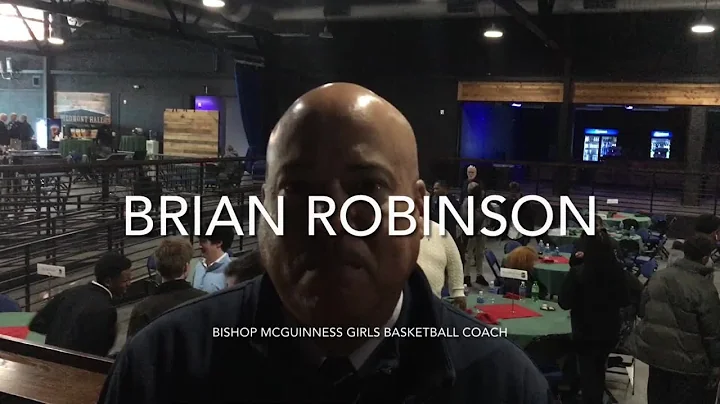 Bishop McGuinness girls basketball coach Brian Rob...