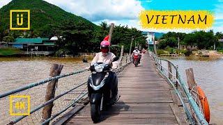 Motorbike ride over a wooden xylophone bridge. Nha Trang, Vietnam. [4K]