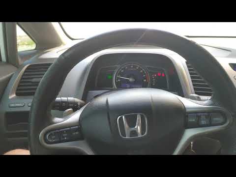 Vídeo: Como você verifica o consumo de combustível em um Honda Civic 2008?