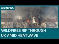 Wildfires rip through the UK amid record-breaking heatwave | ITV News