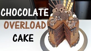 The full recipe and baking instructions for this cake can be found
here: https://chelsweets.com/2017/05/22/chocolate-overload-cake/ you
see tuto...