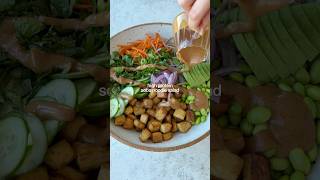 High protein soba noodle salad (vegan)
High protein soba noodle salad👇🏼🌿 With almond butter sauce, crispy baked tofu, fresh veggies and herbs. It’s so nourishing and just hits the spot for lunch!
Follow @tessbegg for more recipes!
Serves 2
Per serve: 700 cal, 42g protein, 80g carb, 28g fat, 20g fibre
Tofu:
300g firm tofu
1/2 tbsp maple syrup
1/2 tbsp soy sauce
1/2 tbsp olive oil
1 tbsp corn starch
Other:
1 serving (90g) soba noodles, cooked to package instructions
100g cooked edamame
1 medium carrot, julienned
1 medium cucumber, thinly sliced
1/2 small red onion, thinly sliced
1/2 avocado, sliced
1 cup chopped fresh mint
1 cup chopped fresh coriander
Lime
Dressing:
2 tbsp (30g) smooth almond butter
Juice from 1 lime
1 tbsp Canadian maple syrup
1 tbsp soy sauce
Water to thin as needed
Preheat the oven to 200°C. Dice the tofu into cubes and add to a container with the maple syrup, olive oil, soy sauce, corn starch. Toss until well coated. Spread the tofu out on non-stick or lined baking tray and bake for 25 minutes, until golden and crisp.
Whisk the almond butter, lime juice, maple syrup and soy sauce together in a small bowl until smooth. You can adjust the texture by adding more peanut butter to thicken or 1/2 tbsp water to thin.
Add everything to a large salad bowl and drizzle over the dressing, then toss and enjoy.
#vegan #easyrecipes #salad #tofu #plantbased healthy recipes High protein soba noodle salad (vegan)