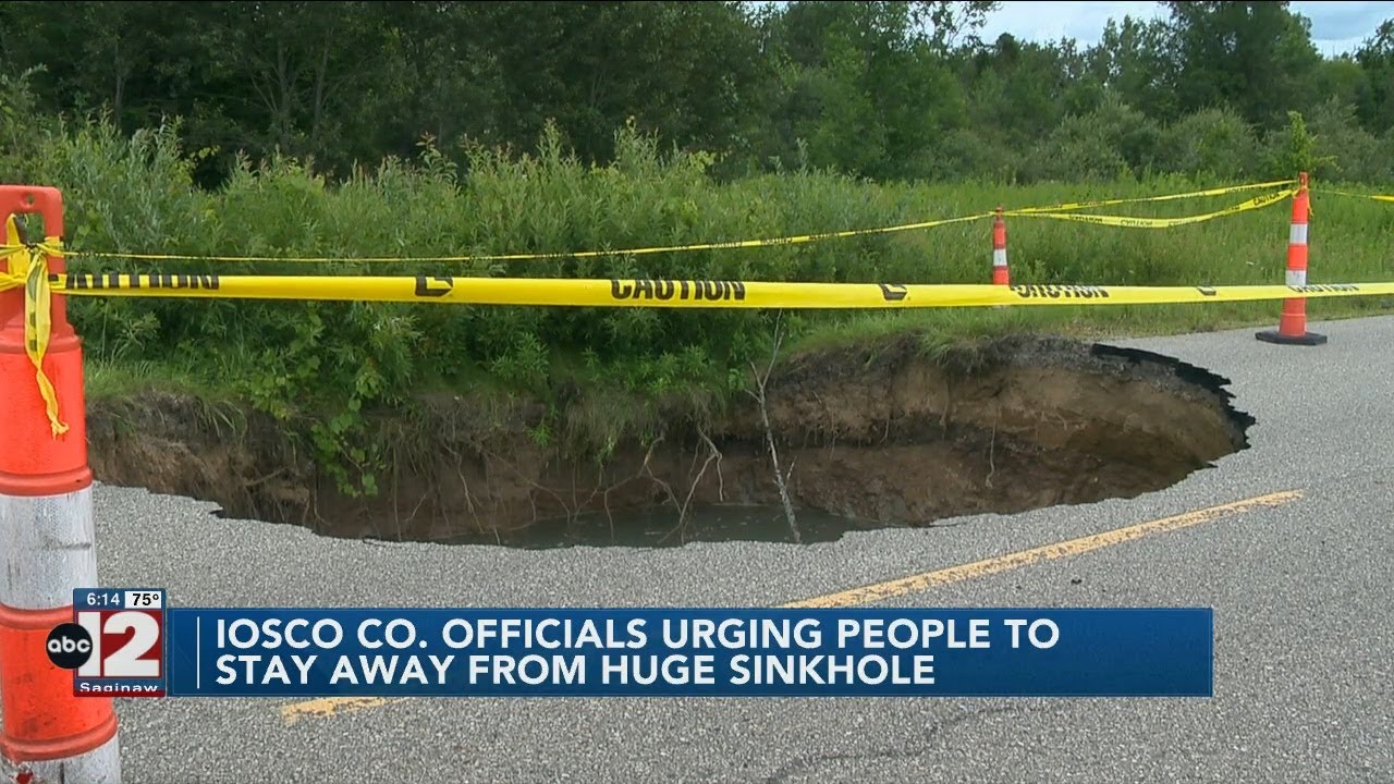 People urged to stay away from Iosco County sinkhole - YouTube