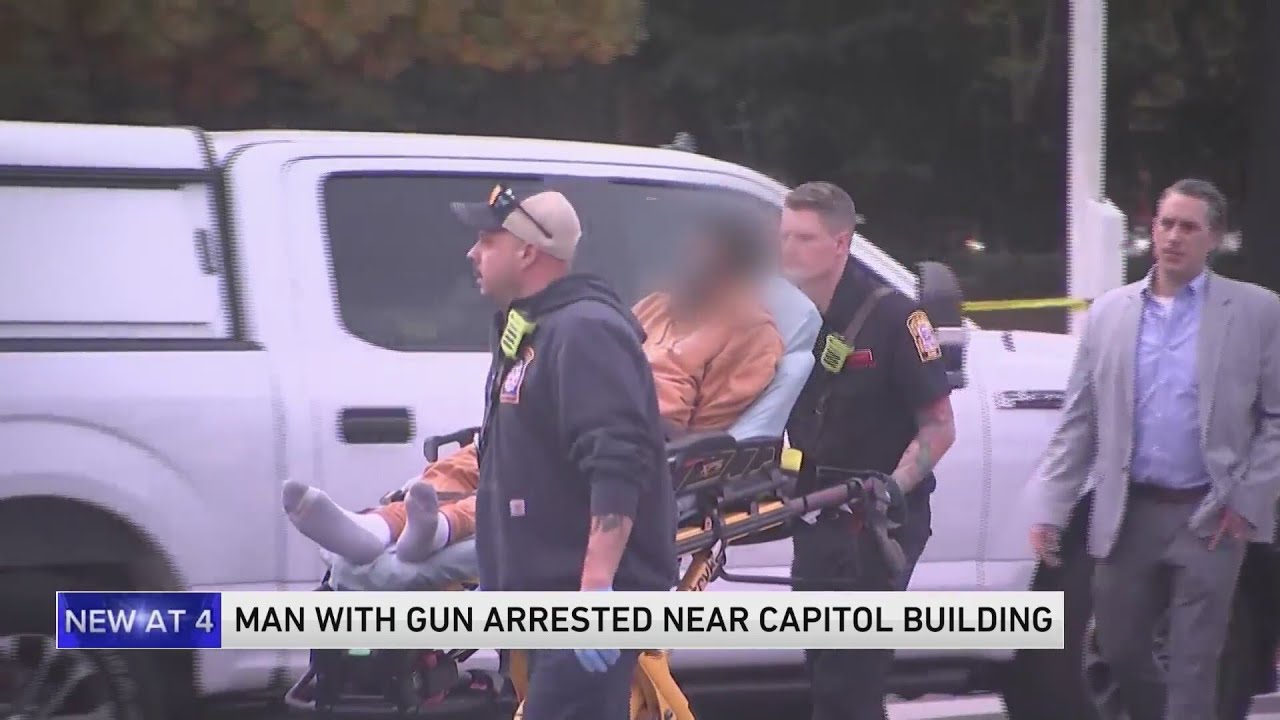 A man with a gun is arrested in a park near the US Capitol - YouTube