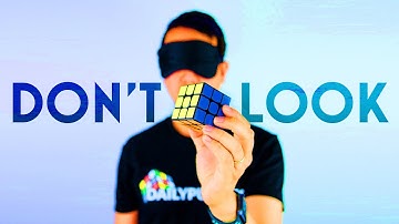 Wear a blindfold, solve a Rubik