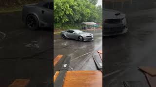 Widebody Camaro pulling out into the rain
