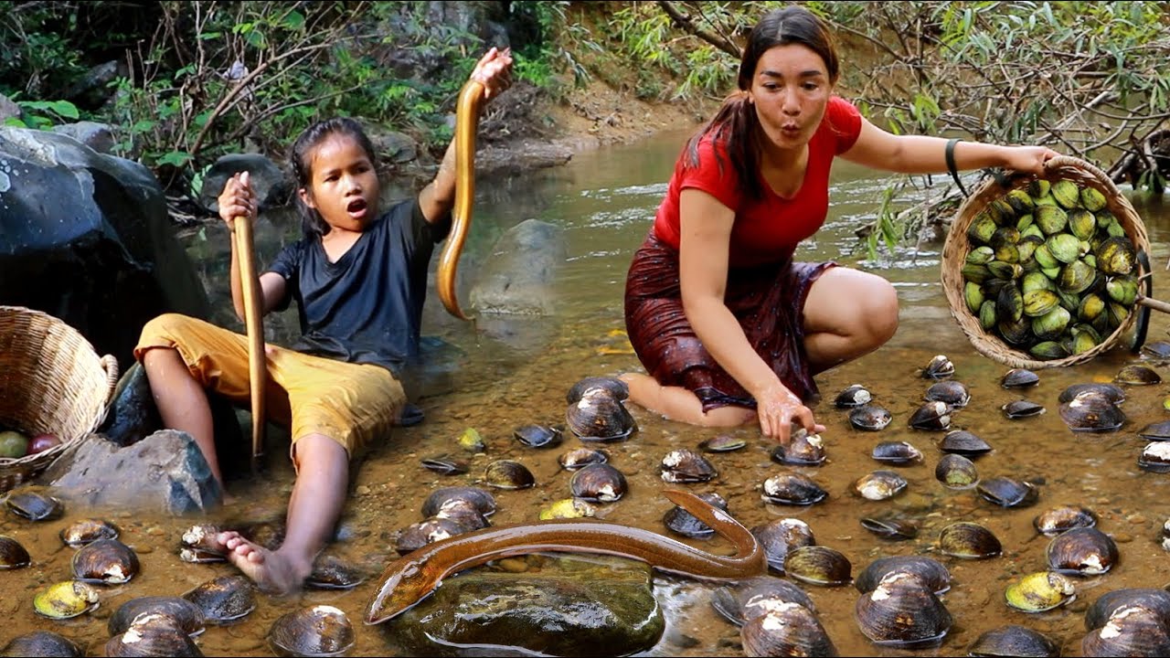 Catch and cook ell for survival food- Pick up a lot big shell for ...