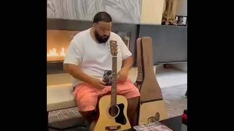 Deejay Khalid - Gets Signature guitar from Bob Marley 💯🇯🇲🔥