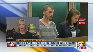 Police say man pointed fake gun at officers