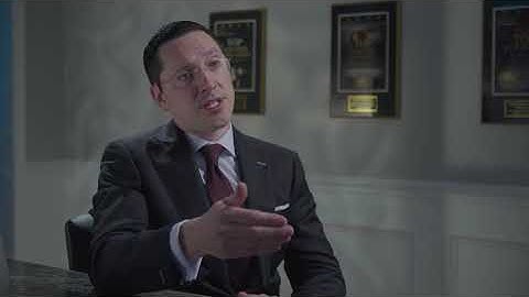 What is the difference between a Warrant and a Summons?