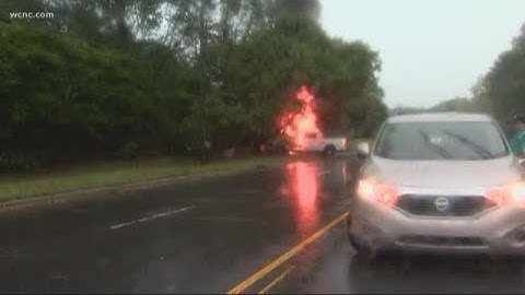 Truck crashes and catches on fire, driver survives