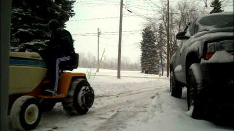Cub Cadet 1211 Plowing Snow with 54" Blade