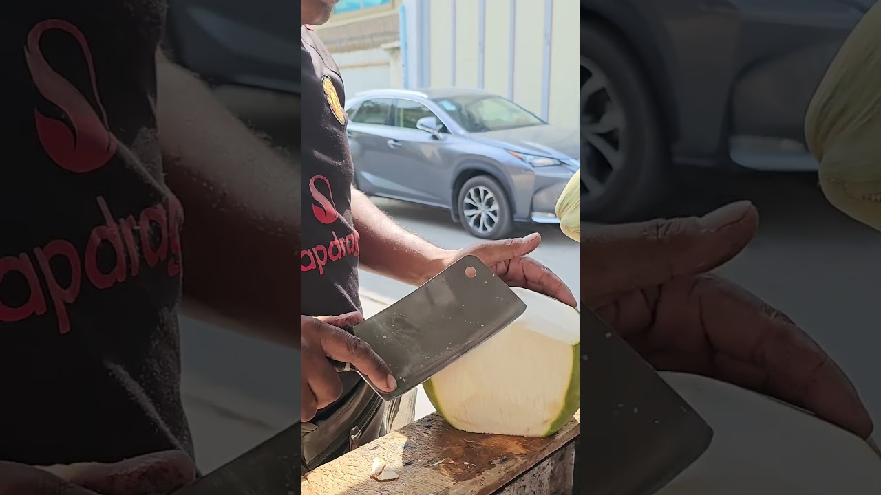 Cutting fresh coconut 