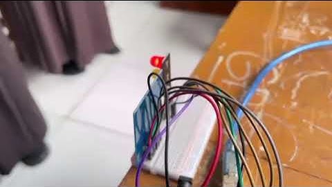 "Sistem Door Lock Berbasis RFID & GUI Serial Delphi"