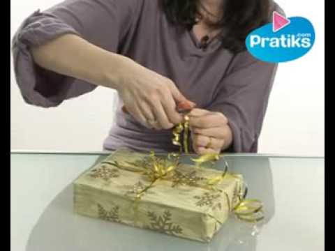Comment friser du ruban pour un paquet cadeau - Vidéo Dailymotion