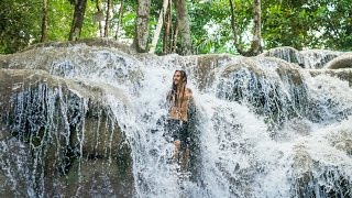 CLIMBING TROPICAL WATERFALL