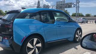 All electric BMW i3 in phalos blue on i95 , closeup.