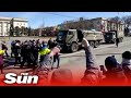 "Go home!" - Protesters confront Russian military vehicles in Ukrainian city of Kherson