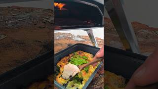 Wild fish of a forester in a brazier - Harsh food