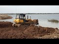 Powerful Dump Truck and Bulldozer at Work - Best Heavy Equipment Dozer Pushing Dirt Filling Lake