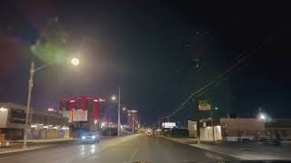 Driving Down The Las Vegas Strip And Naked City The Hood Behind The Strat
