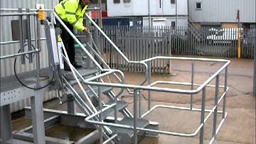 Safe tanker access - folding stairs with air power for road and rail tankers and ISO containers