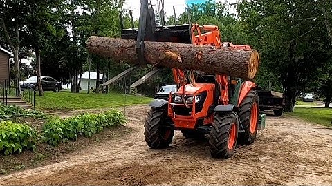 Kubota M7060 With HLA Pallet Forks & Grapple