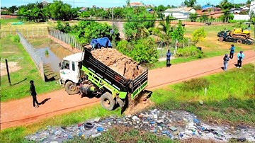 Start Complete New Project On Rice Field By Dump Truck Unloading Soil And Skill Bulldozer Pushing
