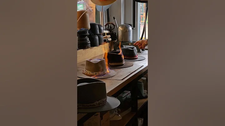 Distressing these handmade bespoke hats to add patina. #hatmaker #hatmakers #hatmaking #hats