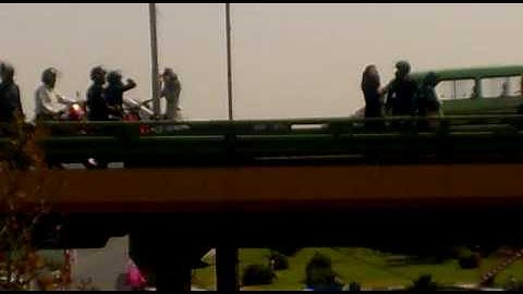 July 17 2009 Tehran- Gisha street 26 tir 1388 after friday prayer- young girl getting kicked in butt