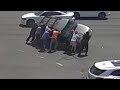 Crowd Flips SUV That Had Been in Car Accident