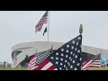 Volunteers plant 2,500 flags at National Veterans Memorial and Museum