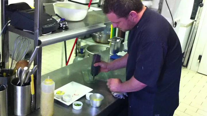 Mark Parris prepares scallops with apple pure in S...