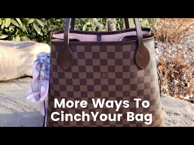 Keeping the Neverfull cinched in???