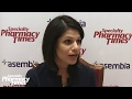 How can specialty pharmacists ensure patients are adhering to therapy