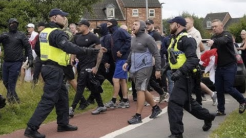 Protesters attack hotel housing asylum seekers in UK as anti-immigration protests spread