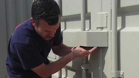 How to close a self storage shipping container fitted with a lock box
