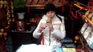 Girl from Shanghai,where I bought a Hulusi,Bawu, Gourd flute
