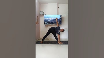 Parivrtta Trikonasana (Revolved Triangle Pose) is a powerful standing twist and side bend.