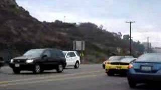 Yellow enzo on pacific coast highway