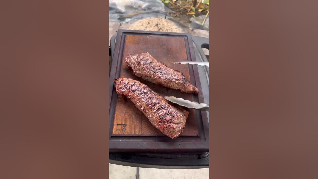 Strip steaks and loaded cheese potatoes