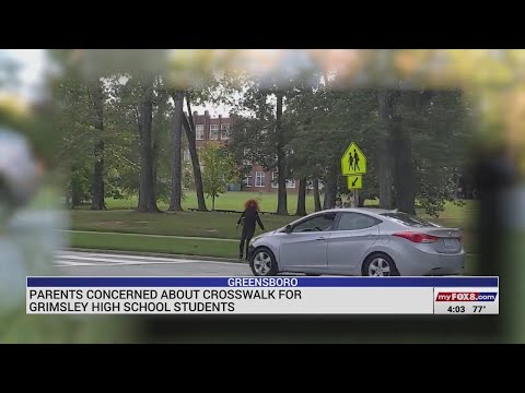 Parents concerned about safety at crosswalk for Grimsley High School Students