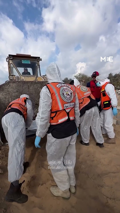 15 unidentified Palestinians killed by Israeli strikes are buried in mass grave in Deir al‑Balah