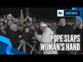 Pope Francis slaps woman