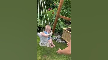 Handmade macrame baby swing