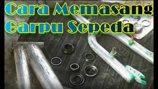 Cara memasang garpu atau fork sepeda