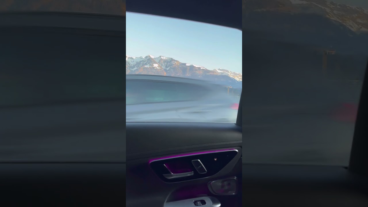 Elegance on wheels, surrounded by Swiss perfection. 🇨🇭