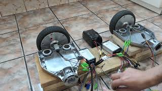 Connecting two hoverboard motors to two controllers, a battery, a throttle and a brake