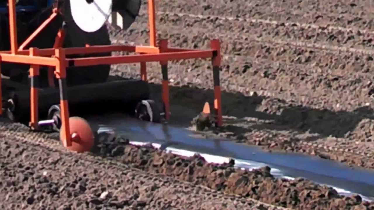 Homemade Plastic Mulch Layer - YouTube