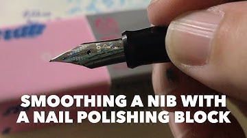 Smoothing a nib with a nail polishing block